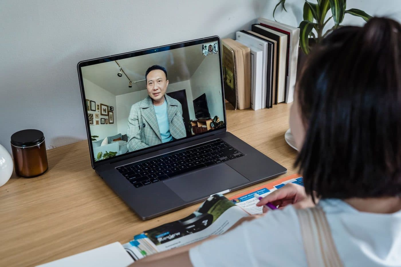 A laptop on a desk during a video appointment